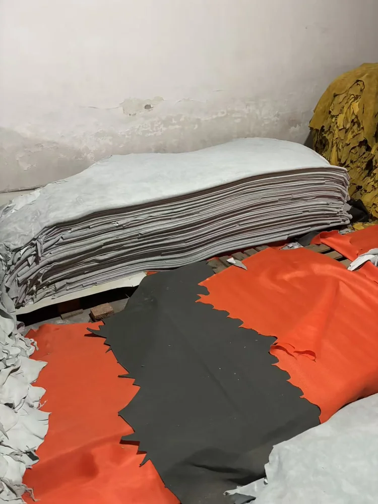 Stacked leather pieces and different colours of material