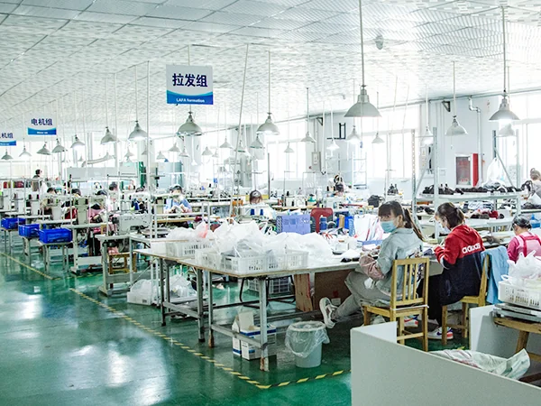 Work tables and hair materials in a supplier workshop photograph