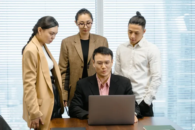 Business professionals reviewing information together