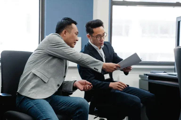 Business discussion with documents at a table