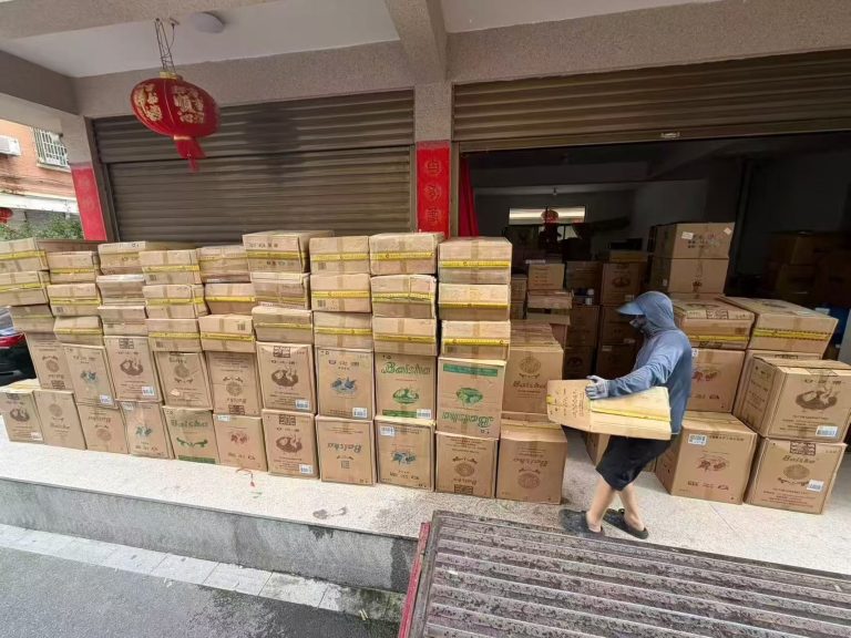 Packed cartons staged before transport